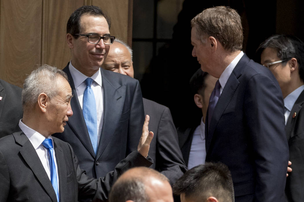 Treasury Secretary Steve Mnuchin, second from left, and United States Trade Representative Robe ...