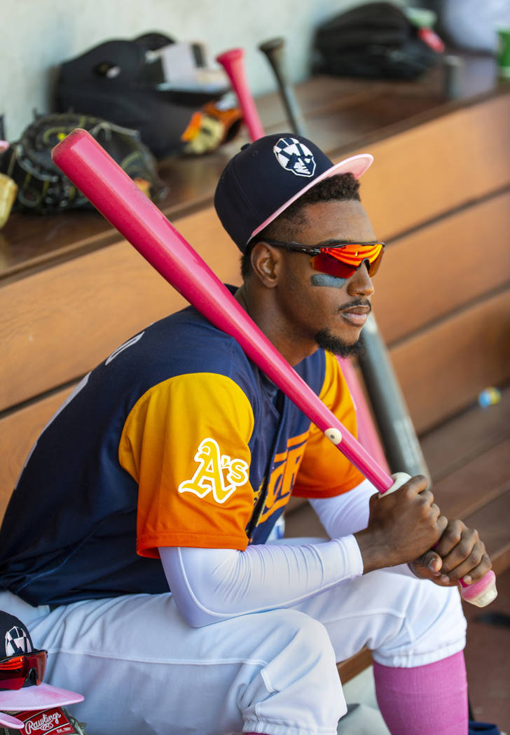 Aviators shortstop Jorge Mateo (14) watches his teammates from the dugout as they face the Taco ...