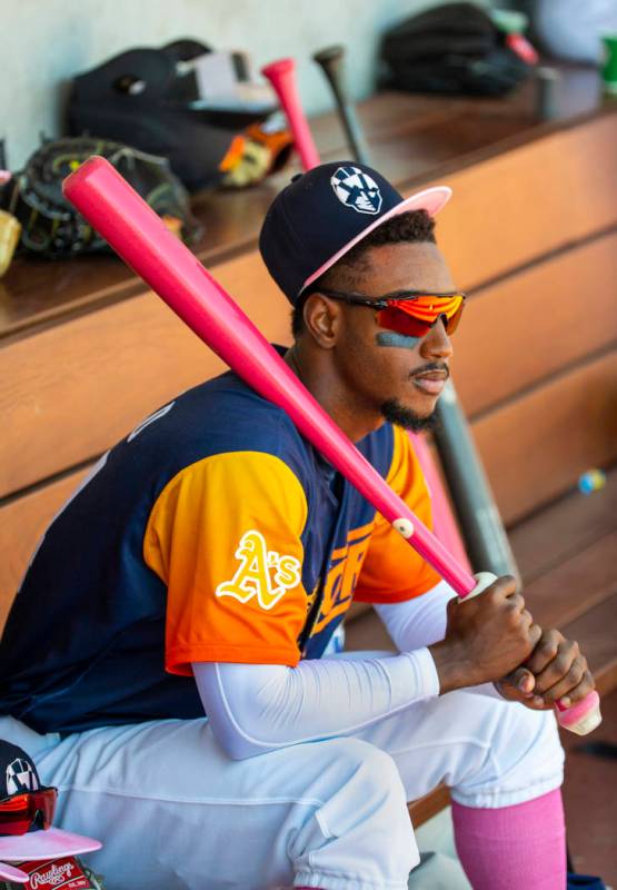 Aviators shortstop Jorge Mateo (14) watches his teammates from the dugout as they face the Taco ...