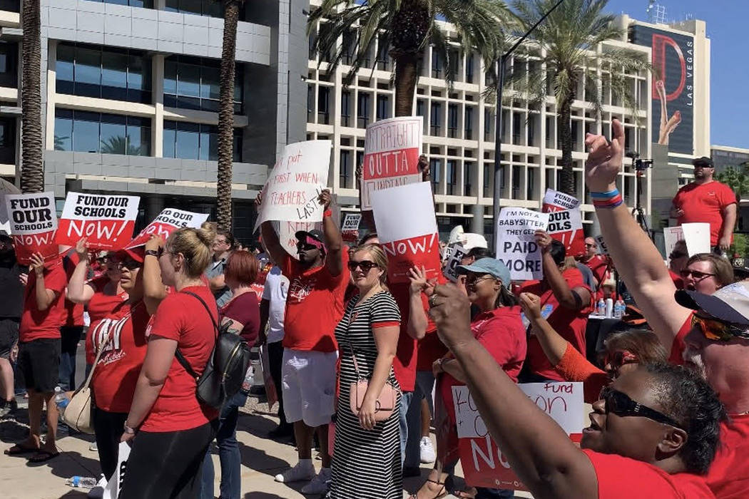 Thousands of educators, parents and students gather to rally to secure additional education fun ...