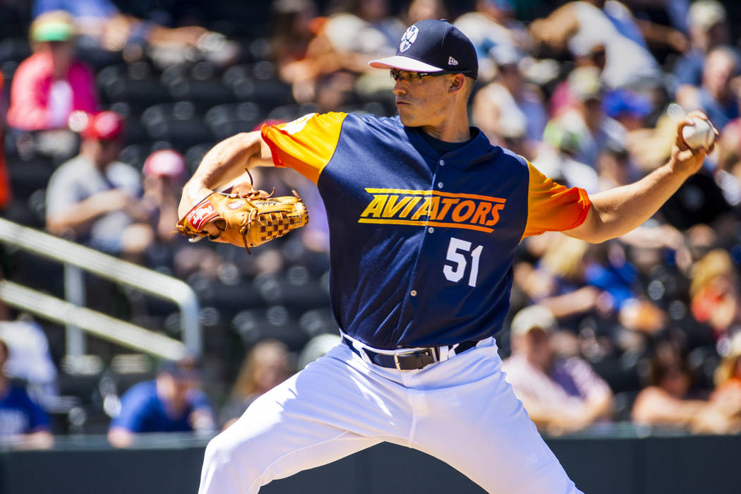 The Aviators pitcher Kyle Lobstein (51) winds up for another throw versus the Tacoma Rainiers a ...