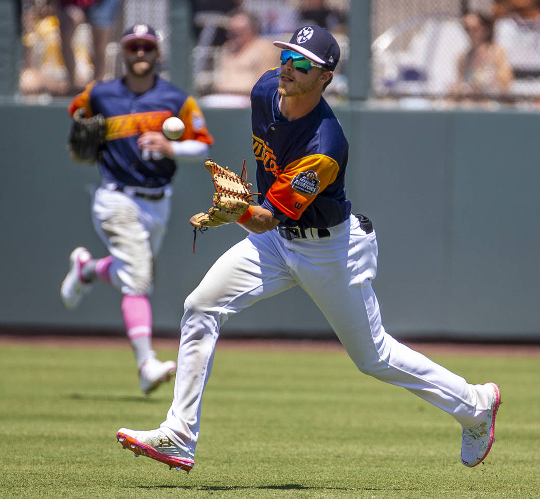 The Aviators Skye Bolt (8) readies to catch a ball short in right field hit by the Tacoma Raini ...