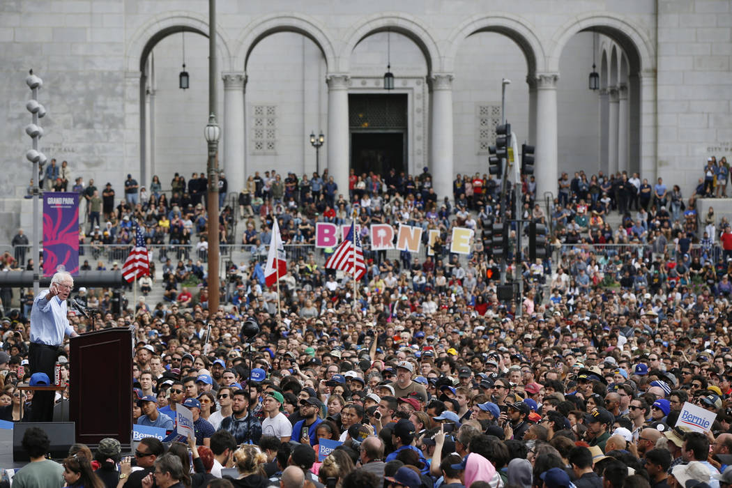 Sen. Bernie Sanders speaks to people gathered at a rally at Grand Park in Los Angeles in March ...