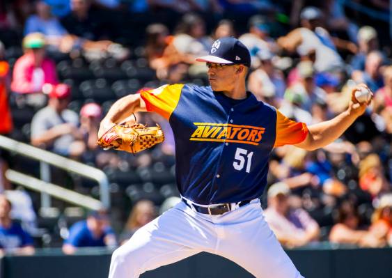 The Aviators pitcher Kyle Lobstein (51) winds up for another throw versus the Tacoma Rainiers a ...