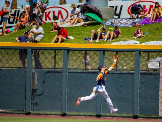 The Aviators Skye Bolt (8) misses a deep fly ball in right field hit off the wall by the Tacoma ...