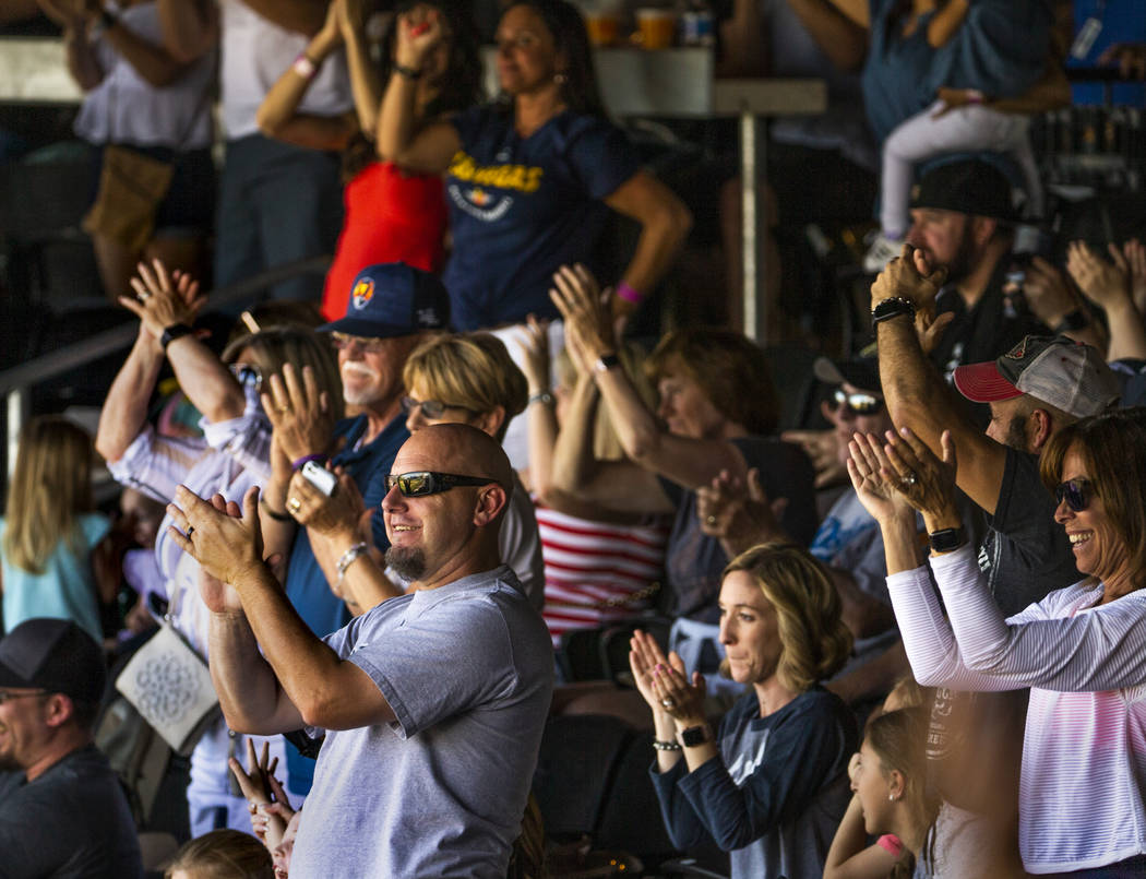 Aviators fans celebrate a grand slam late in the game versus the Tacoma Rainiers at the Las Veg ...