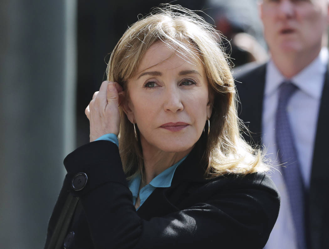 FILE - In this April 3, 2019 file photo, actress Felicity Huffman arrives at federal court in B ...