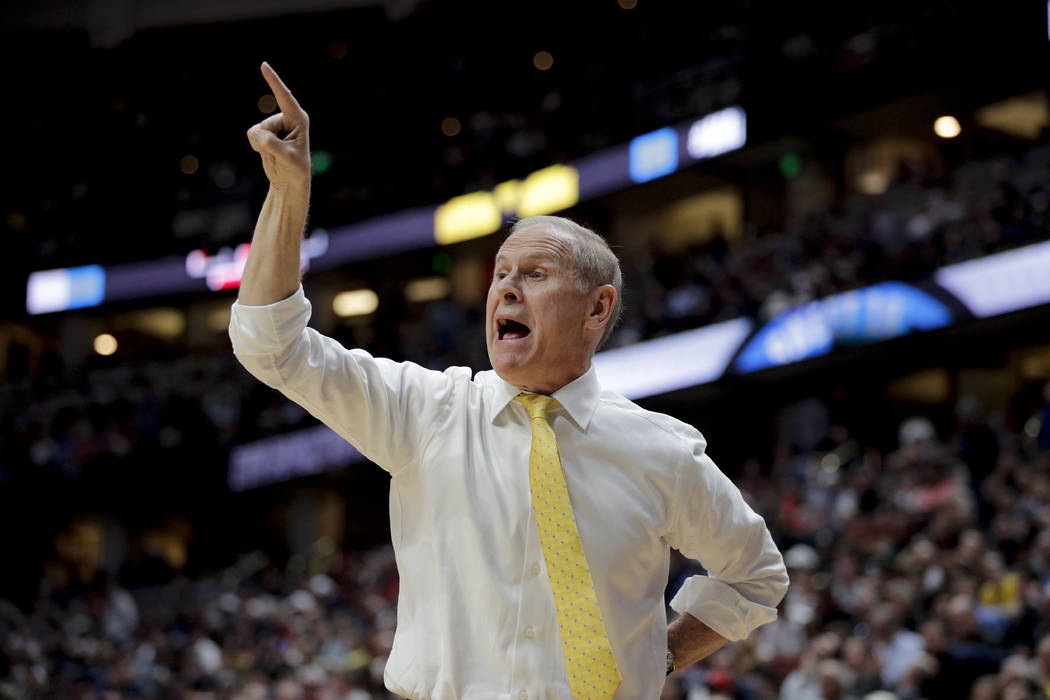 Michigan coach John Beilein shouts during the first half of the team's NCAA men's college baske ...