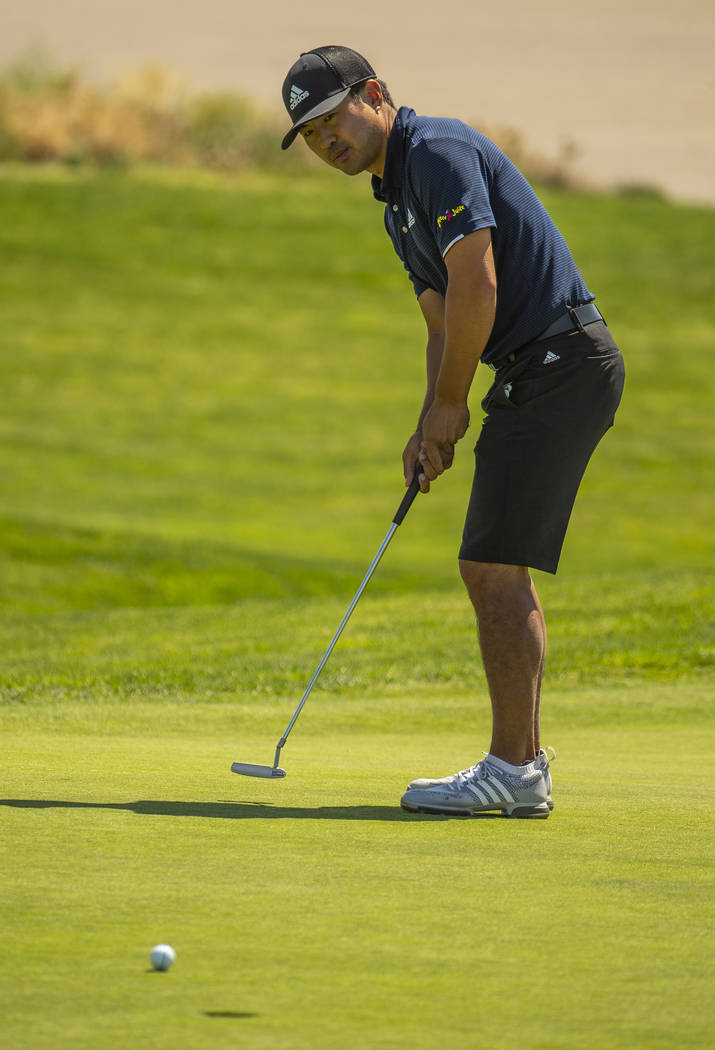 Golfer Alexander Kang looks a putt all the way in during a PGA US Open qualifying round at the ...
