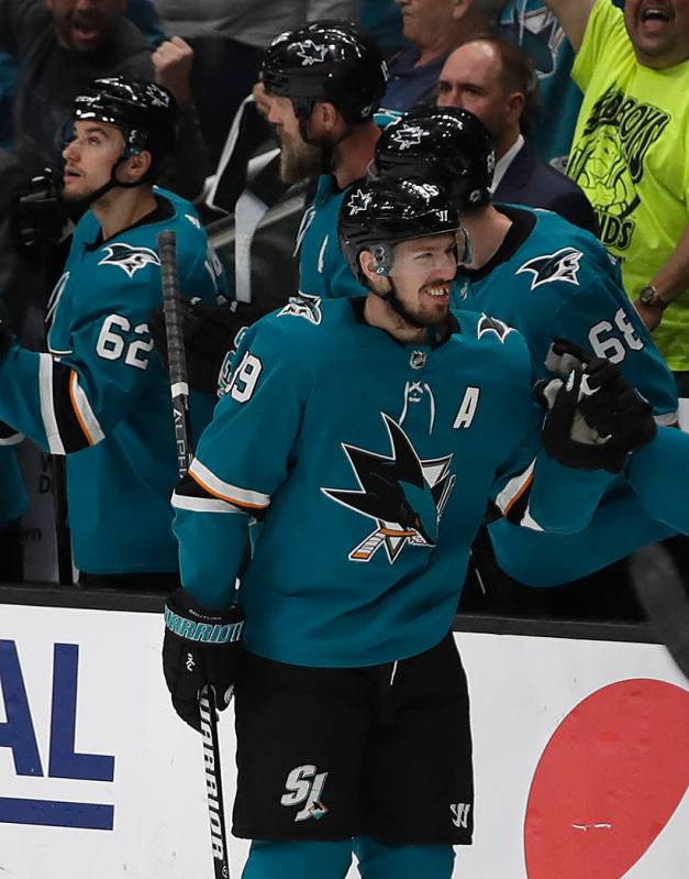 San Jose Sharks' Logan Couture (39) celebrates after scoring a goal against the St. Louis Blues ...