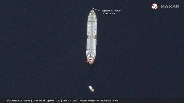 This satellite image provided by Maxar Technologies shows the Saudi-flagged oil tanker Al Marzo ...
