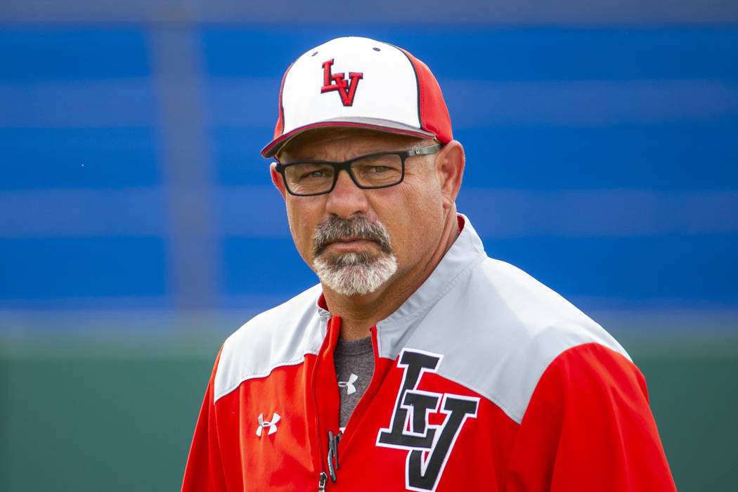 Longtime Las Vegas High coach Sam Thomas eyes his players during their state baseball tournamen ...