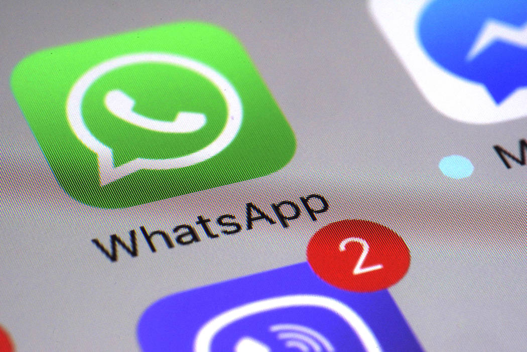A March 10, 2017, file photo shows the WhatsApp communications app on a smartphone, in New York ...