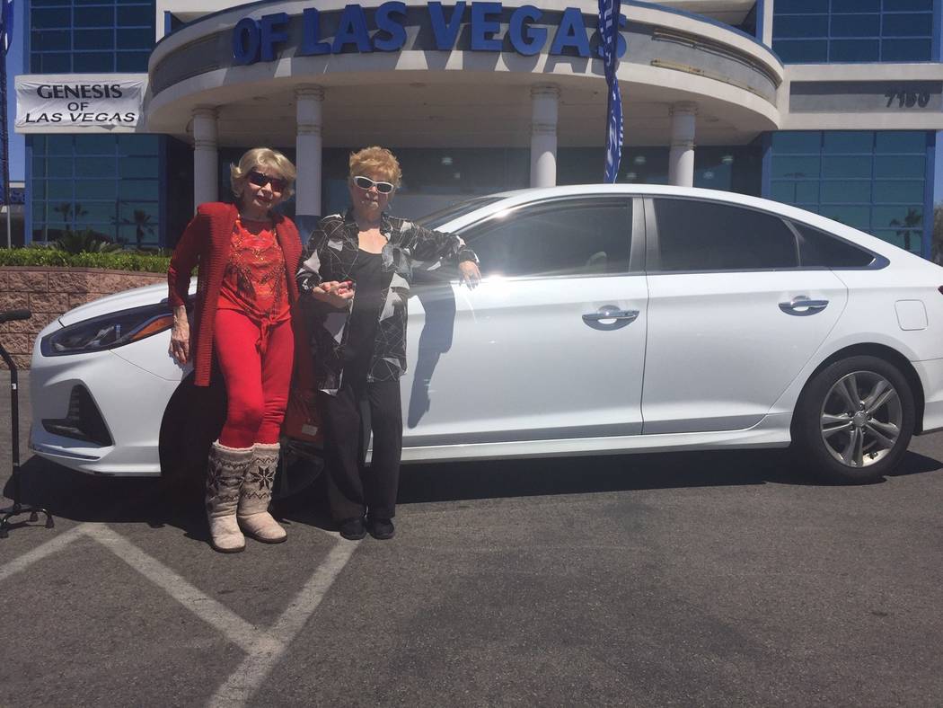 Hyundai of Las Vegas customer Diane Bedno, right, and her sister, Rita Keenan, are seen with th ...