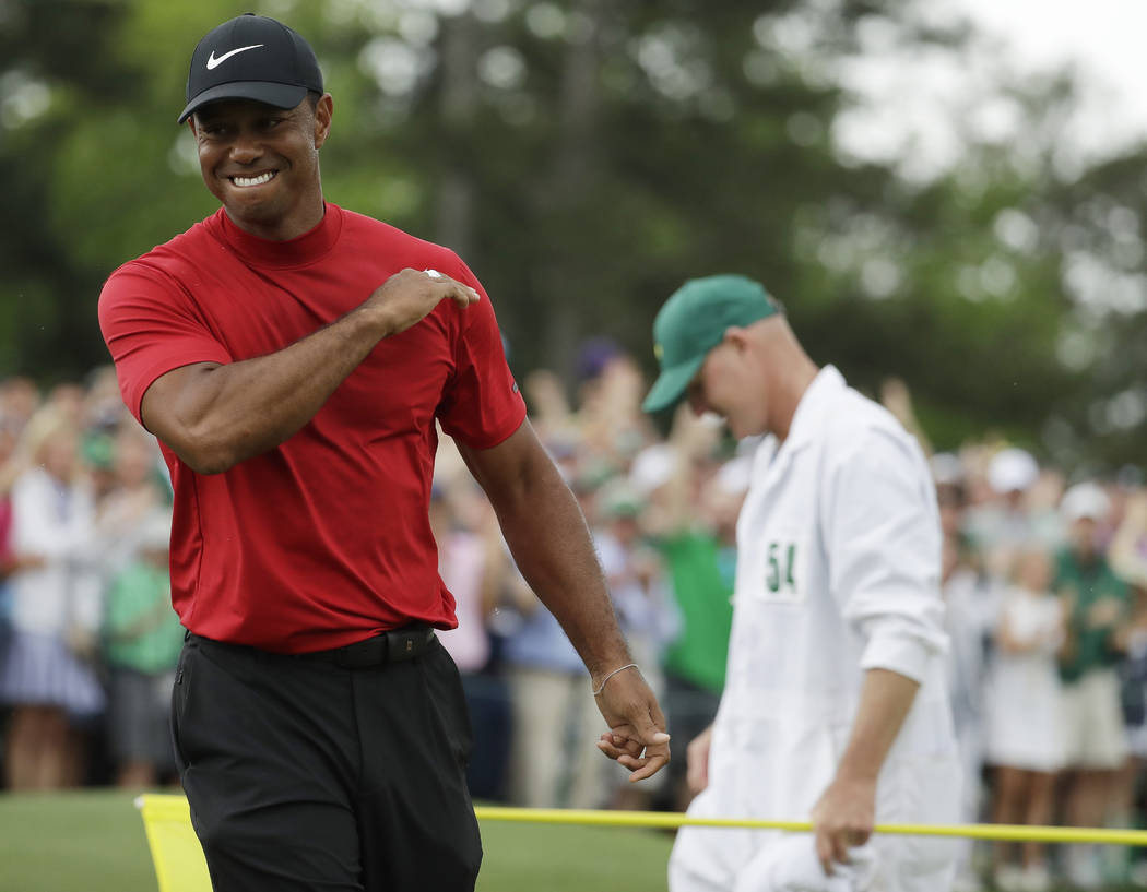 Tiger Woods reacts as he wins the Masters golf tournament Sunday, April 14, 2019, in Augusta, G ...