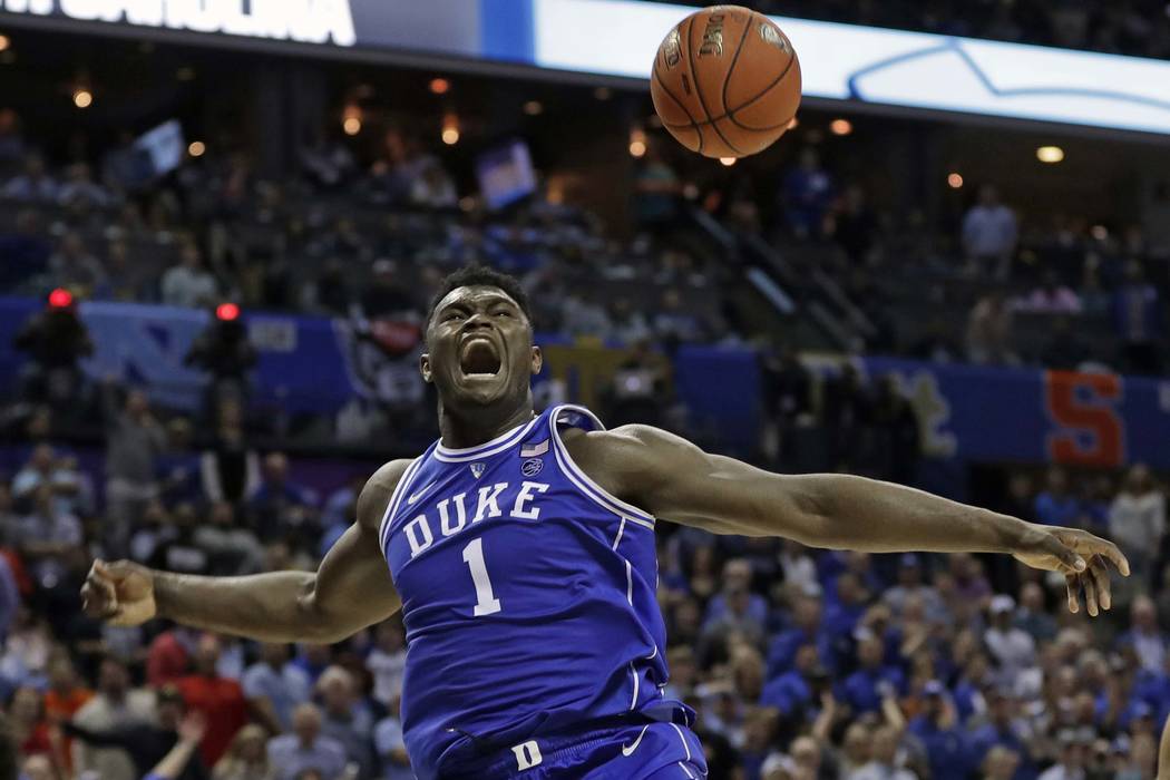 Duke's Zion Williamson (1) reacts after a dunk against North Carolina during the second half of ...