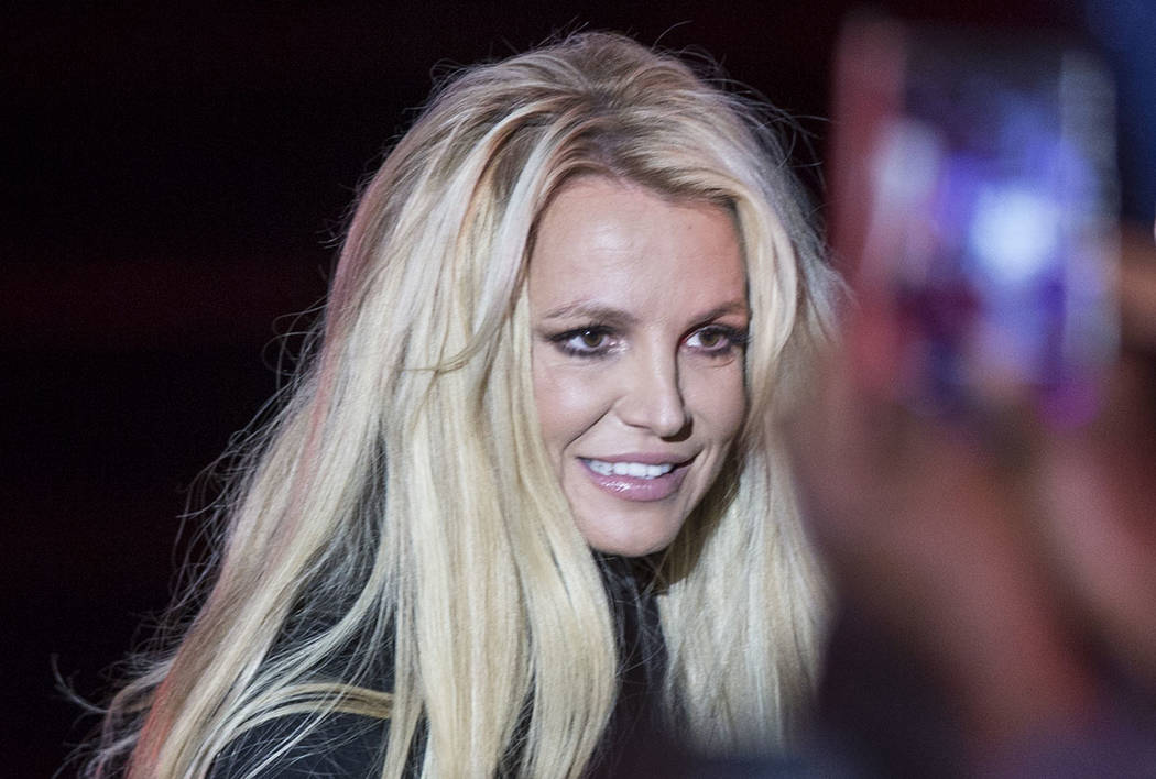 Britney Spears signs autographs during an event to announce her new residency at The Park Theat ...