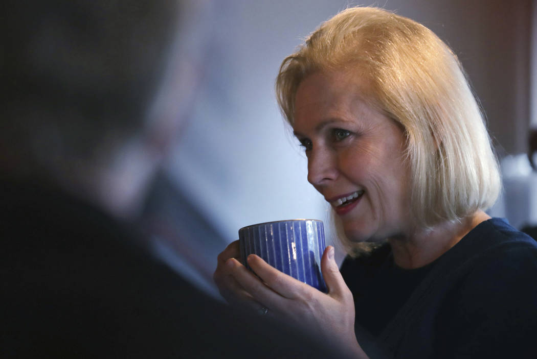 Democratic presidential candidate Sen. Kirsten Gillibrand, D-N.Y., listens to a question during ...