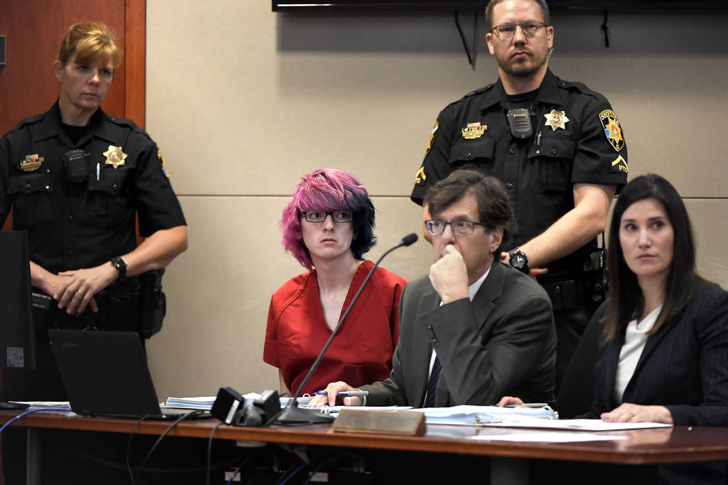 Devon Erickson, second from left, appears in court at the Douglas County Courthouse on Wednesda ...
