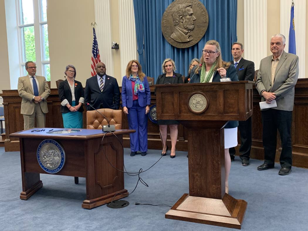 Assemblywoman Maggie Carlton, D-Las Vegas, speaks at the bill signing for Assembly Bill 469. Th ...