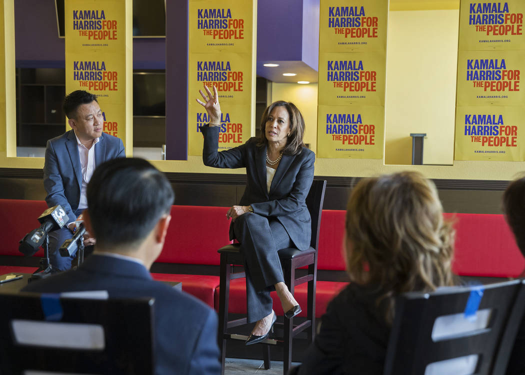 Presidential candidate Sen. Kamala Harris, middle, D-Calif., addresses the audience during a me ...
