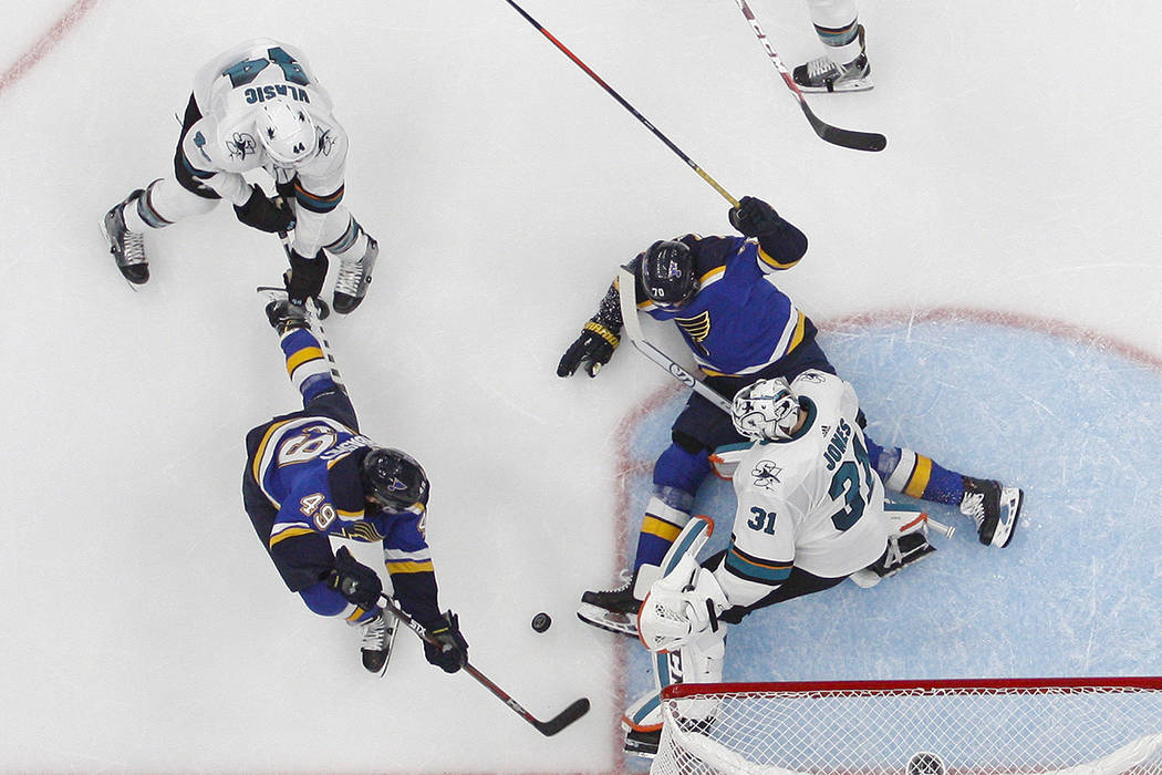 San Jose Sharks goaltender Martin Jones (31) blocks the puck as St. Louis Blues center Ivan Bar ...