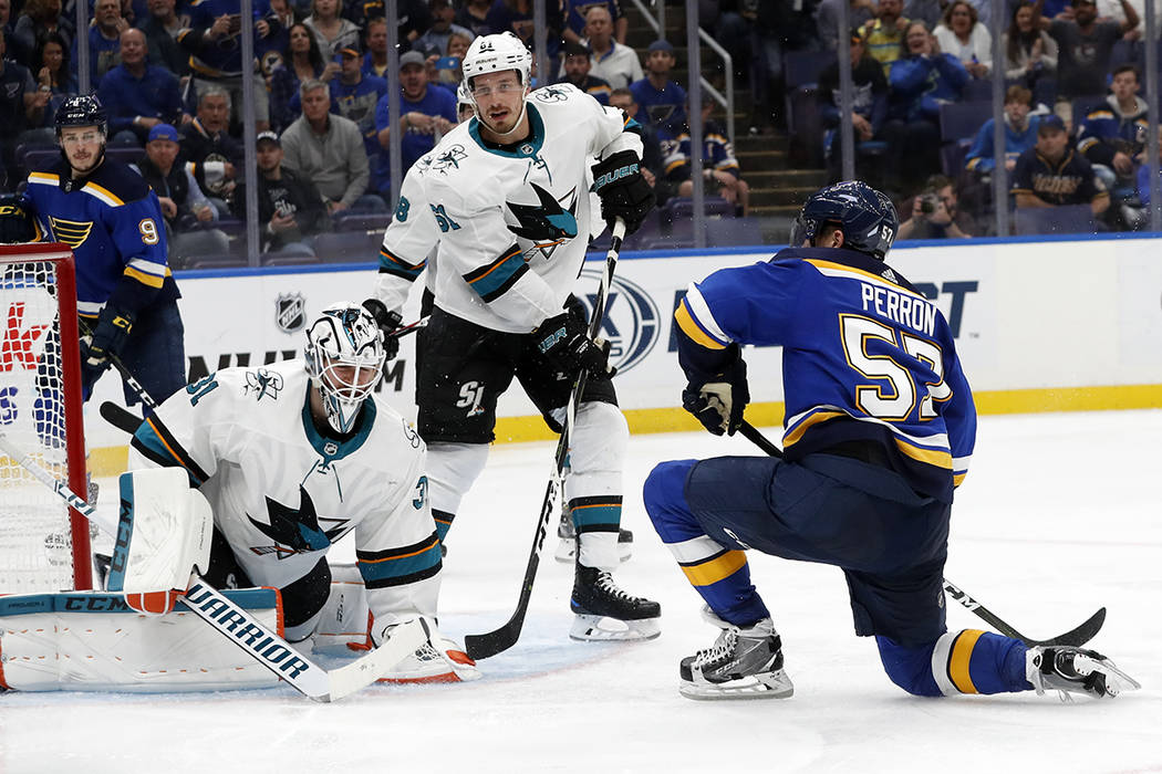 San Jose Sharks goaltender Martin Jones (31) blocks a shot by St. Louis Blues left wing David P ...