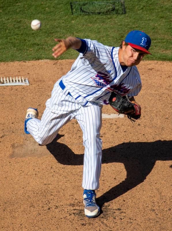 Reno pitcher Toray Felix (31) fires another throw to a Desert Oasis batter during their Class 4 ...