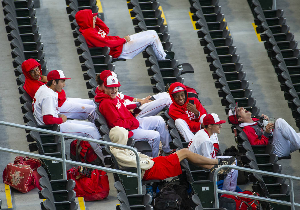 Arbor View players share some laughs in the stands before their game versus Las Vegas during th ...