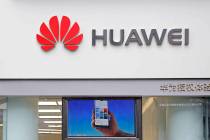 A logo of Huawei is displayed March 7, 2019, at a shop in Shenzhen, China's Guangdong province. ...