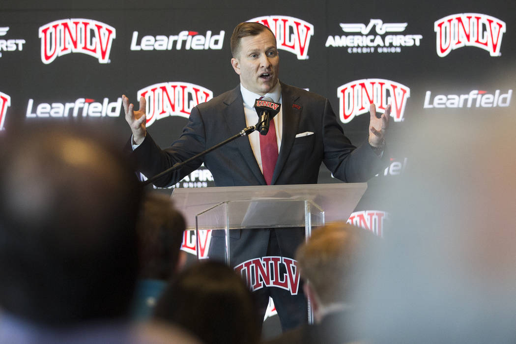 New UNLV men's basketball coach T.J. Otzelberger addresses the crowd at the Strip View Pavilion ...