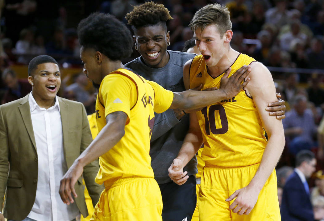 Arizona State forward Vitaliy Shibel (10) celebrates his dunk against Southern California with ...