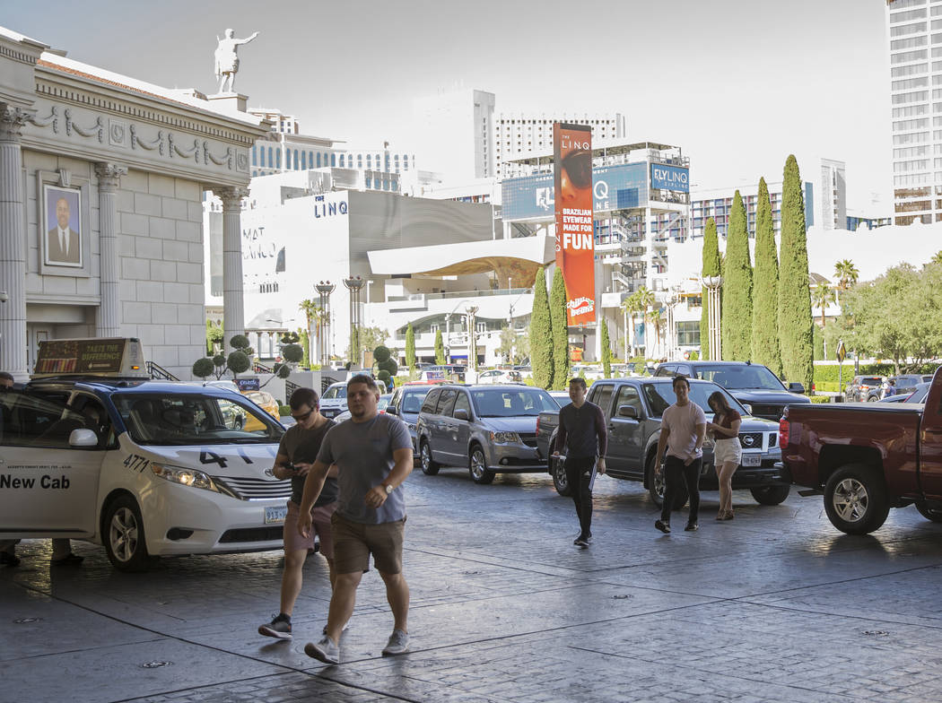 Visitors walk in the main entrance at Caesars Palace on Thursday, May 16, 2019, in Las Vegas. ( ...