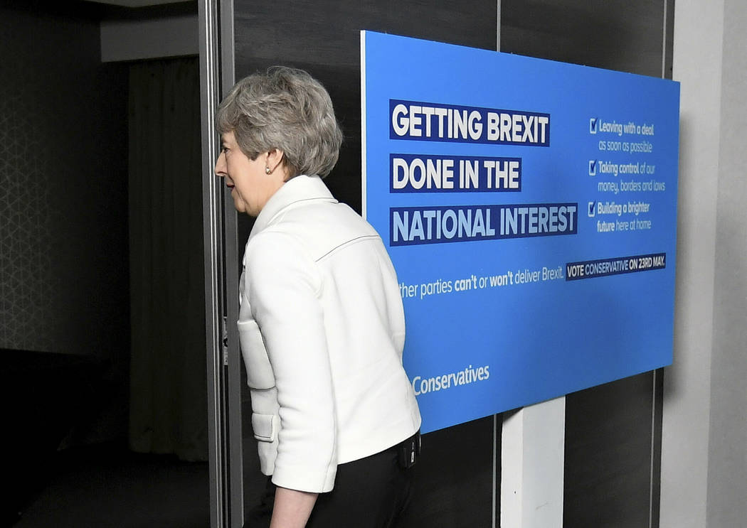 Britain's Prime Minster Theresa May leaves after speaking at a EU election campaign event in Br ...