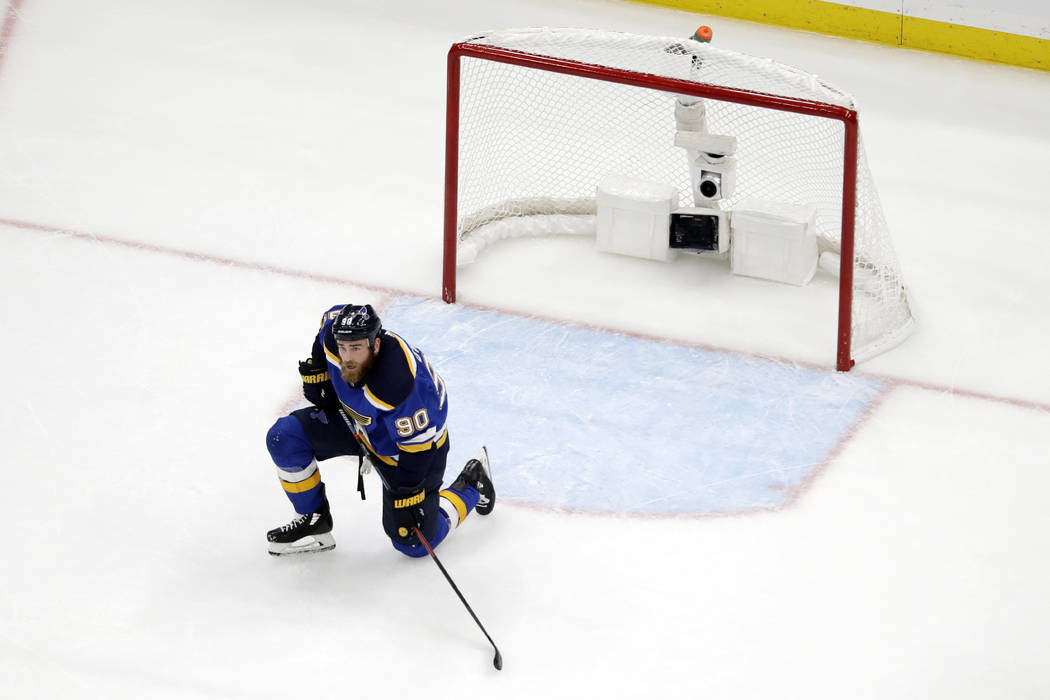 St. Louis Blues center Ryan O'Reilly (90) kneels by the net after the San Jose Sharks tied the ...