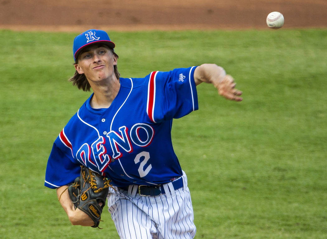 Reno pitcher John Barry (2) first a throw to a Desert Oasis batter in the first inning during t ...