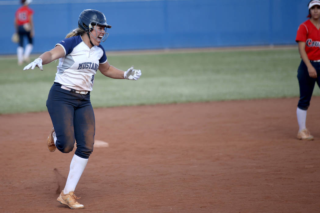 Shadow Ridge's Shea Clements celebrates her go-ahead home run against Coronado in their Class 4 ...