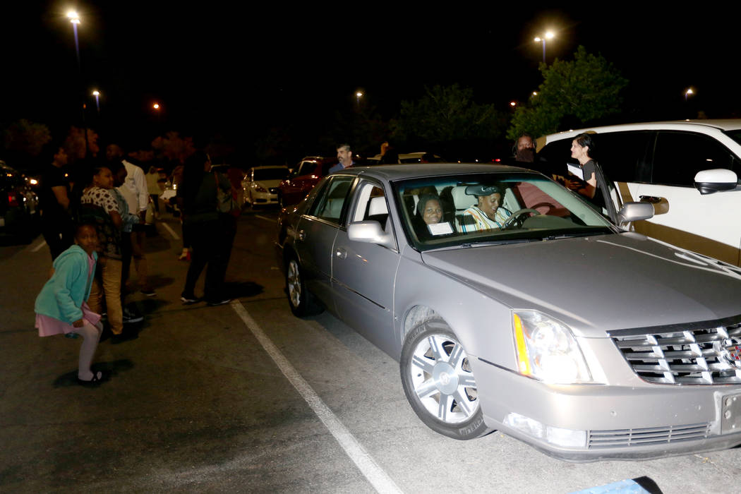 Tyria Smith checks out her new car at Sierra Vista High School in Las Vegas, Thursday, May 16, ...