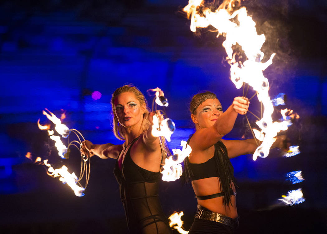 Members of Springfield Aerial Fitness perform with fire during the first day of the Electric Da ...