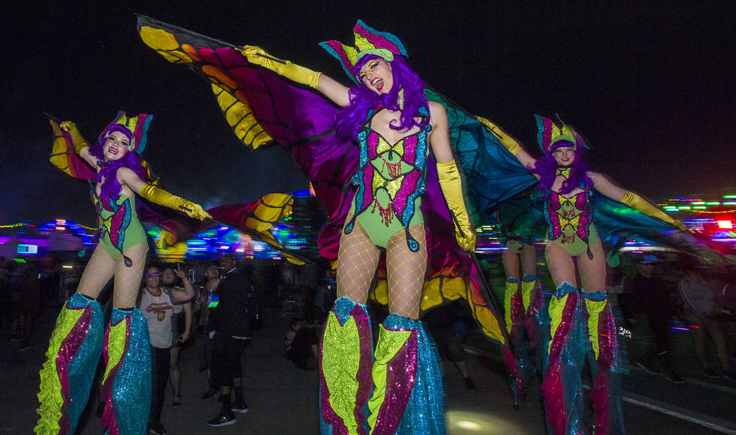 Electric Ladyland Stilt Walkers make their way down Rainbow Road during day two of Electric Dai ...
