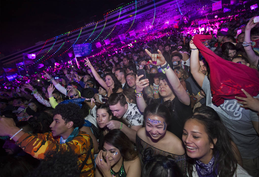 Fans cheer for A$AP Rocky during his performance on the Cosmic Meadow stage during day two of E ...
