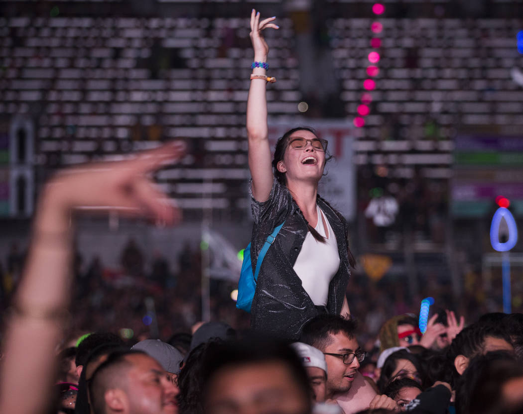 Fans cheer for A$AP Rocky during his performance on the Cosmic Meadow stage during day two of E ...