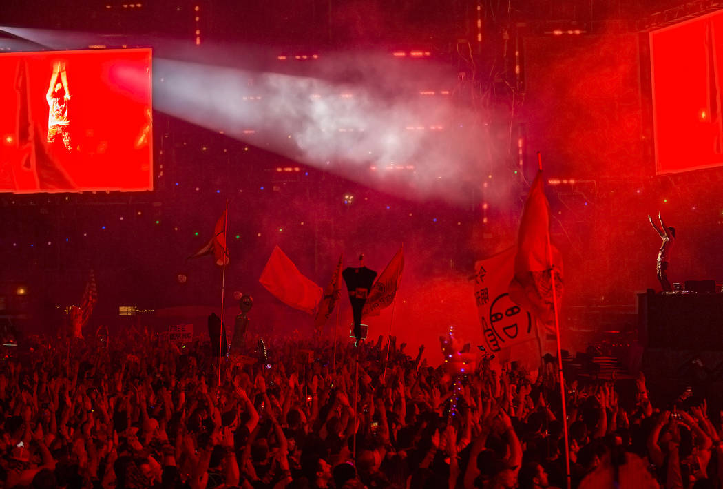 Steve Aoki, top/right, performs at the Circuit Grounds stage on day three of Electric Daisy Car ...