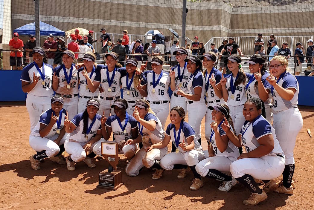 Shadow Ridge players pose for a team photo after defeating Coronado, 13-3 in the Class 4A state ...