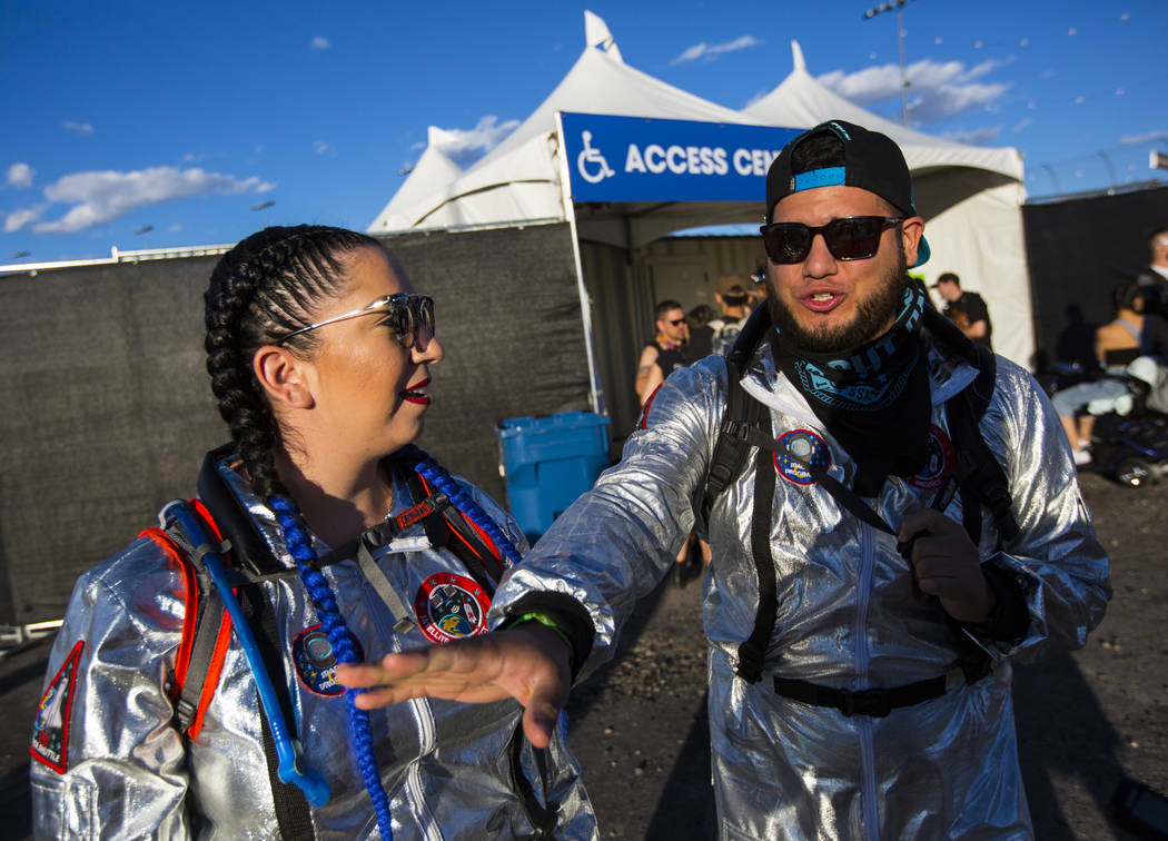 Rachel Martinez, left, and Jesse Andrade during the first day of the Electric Daisy Carnival at ...