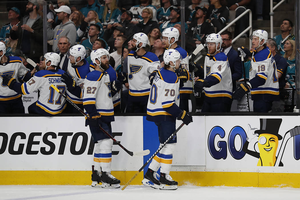 St. Louis Blues' Alex Pietrangelo (27) and Oskar Sundqvist (70) celebrate a goal against the Sa ...