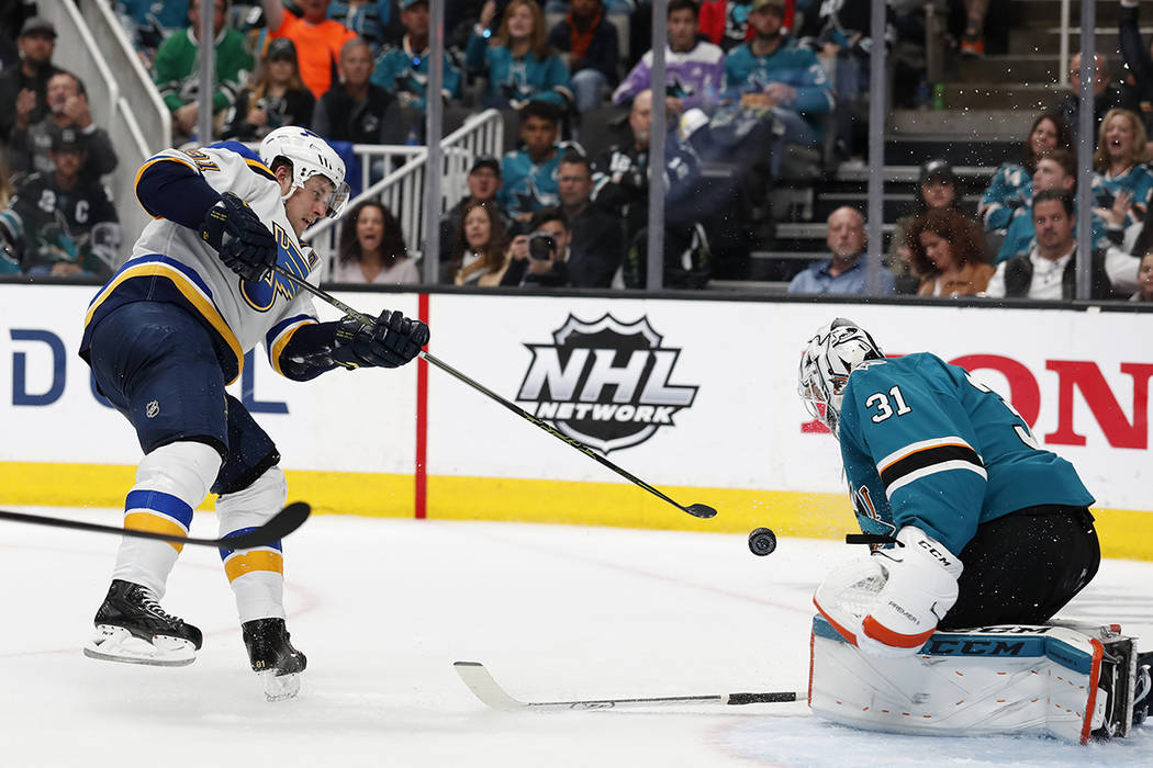 St. Louis Blues' Vladimir Tarasenko (91) shot is blocked by San Jose Sharks goaltender Martin J ...