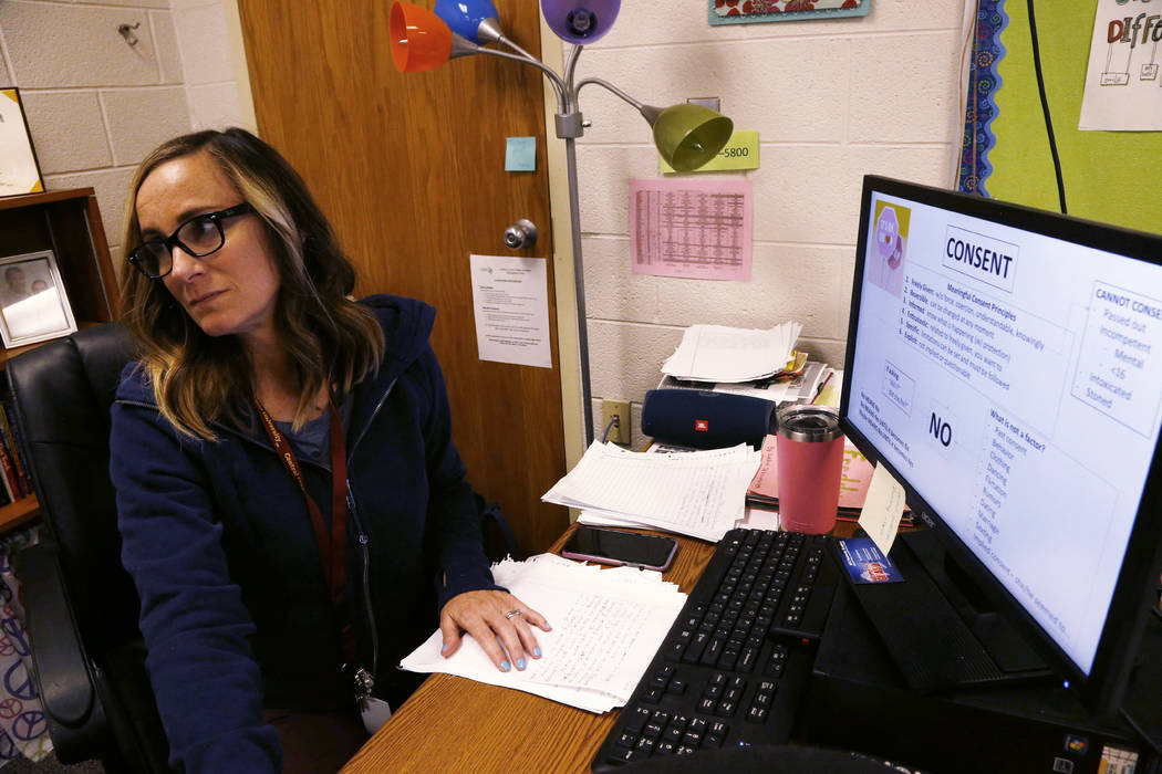 High school health teacher Cathy Booher listens to Wexford County prosecutor Jason Elmore talk ...