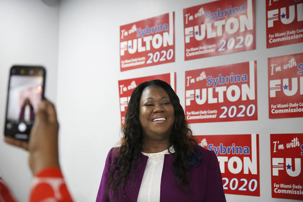 A supporter takes a photograph of Sybrina Fulton after she announced her run for the District 1 ...