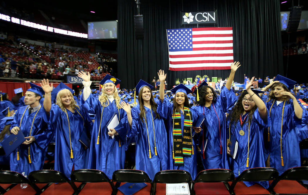 Graduates, from left, Miguel Nunez, Maria Gundacker, Maritta Matveeva, Shannon Greenwood, ...